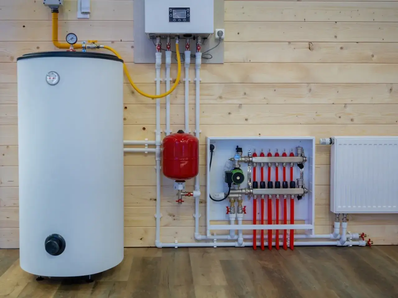 System ogrzewania domu 100m2: bojler, pompa, rozdzielacz i grzejnik. Jaka moc pieca elektrycznego do domu 100m2?
